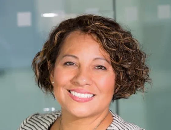 Smiling woman with curly hair